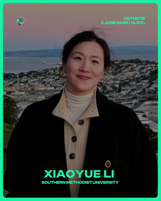 A promotional graphic for the Society for Ethnobotany 2026 conference. A woman with dark hair pulled back smiles warmly at the camera. She is wearing a black coat over a cream-colored button-up cardigan and a white turtleneck, with gold hoop earrings. The background shows a cityscape with a bay and hills at dusk, with a pink and blue sky. A bright green border frames the image. In the upper right, green text reads "Keynote, 2 June 2026, 13.30h." Along the bottom, large bold green text reads "Xiaoyue Li" with smaller text below reading "Southern Methodist University." The SEB 2026 conference logo appears in the upper left corner.