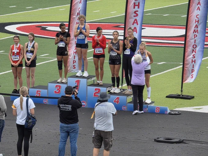 Ali getting her medal