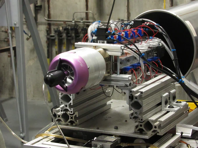 Small gas turbine engine on a work bench.