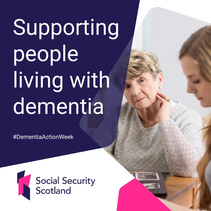 A person is sitting at a table looking at another person who is looking through a photo album. Text on image reads: Supporting people living with dementia 