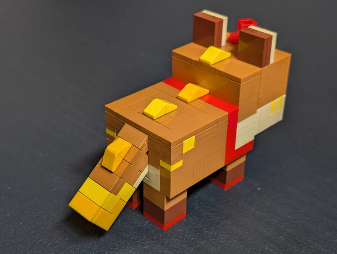 A minecraft inspired Lego model, depicting Yotemotes character, shown from the rear.
