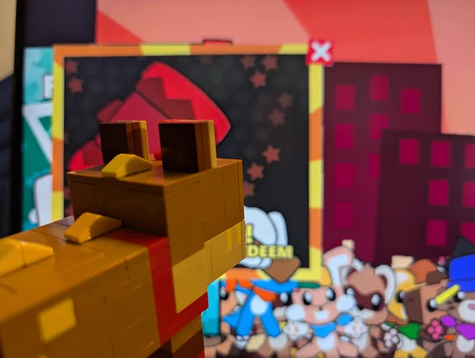 A minecraft inspired Lego model, depicting Yotemotes character. The model is looking at the twitch stream of Yotemotes, where a raffle is about to begin.