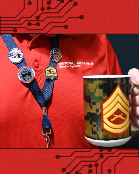 A person wearing a red General Dynamics Mission Systems shirt is holding a mug with a military insignia and camouflage pattern. Four pins are attached to a lanyard around their neck. The background is red with circuit patterns.

GDMissionSystems.com/Military 
