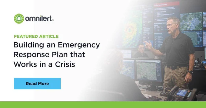 A graphic. The left half is white and fades into an image of an emergency response team in a screen-filled strategy room preparing for a severe weather even. On the white half, in small green text it says "Featured Article," and below it, in larger black font "Building an Emergency Response Plan That Works in a Crisis." Above the text is the Omnilert logo, and below it is a non-clickable button that says "Read More."
