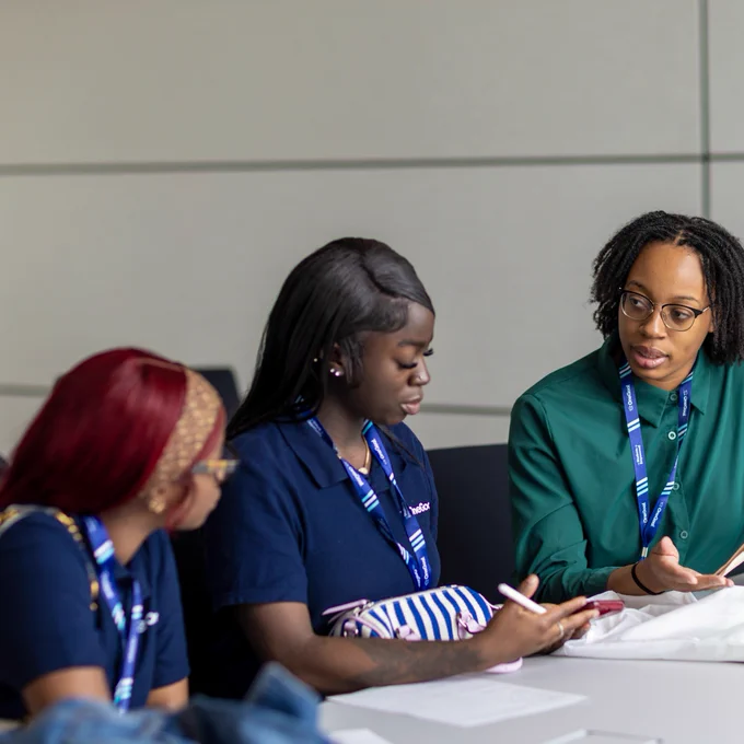 OneGoal student in Chicago networking with community leaders. 
