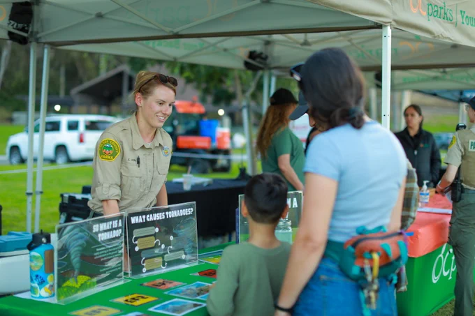 Group of people at OC Parks interpretive booth
