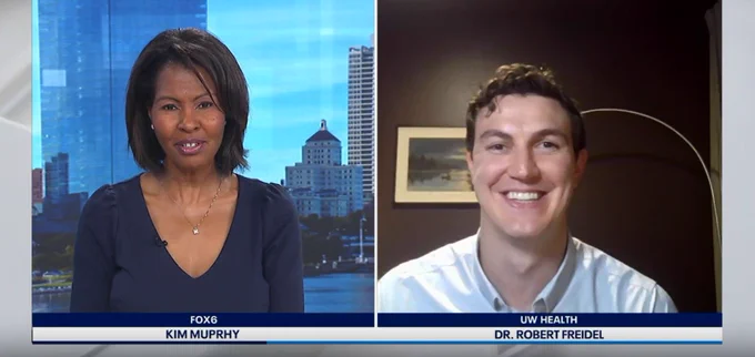 A screengrab of Dr. Robert Freidel on Fox 6 News via zoom next to anchor Kim Murphy