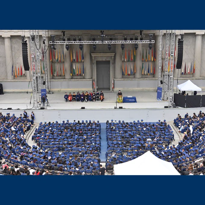 Faculty and graduates in the Hearst Greek Theatre at the 2026 UC Berkeley College of Computing, Data Science, and Society commencement ceremony.