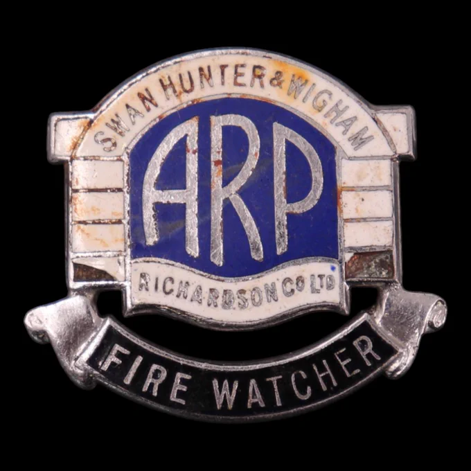 At auction, a Second World War Swan, Hunter and Wigham Richardson Co Ltd ARP Fire Watchers enamelled lapel badge.

As vital strategic targets, major shipyards had their own dedicated Air Raid Precautions (ARP) services or "works wardens".

Image: Laidlaw Auctioneers & Valuers