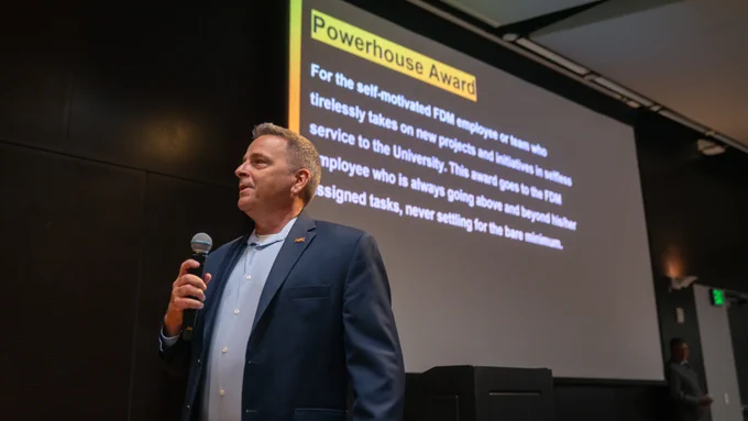 FDM Director Tom Lyons speaks during Arizona State University's FDM Employee Recognition event in May.