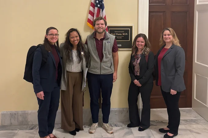 Representing the Physician Assistant Education Association, Justice advocated for healthcare education in Washington during a meeting with an aide for Rep. Neal Dunn.