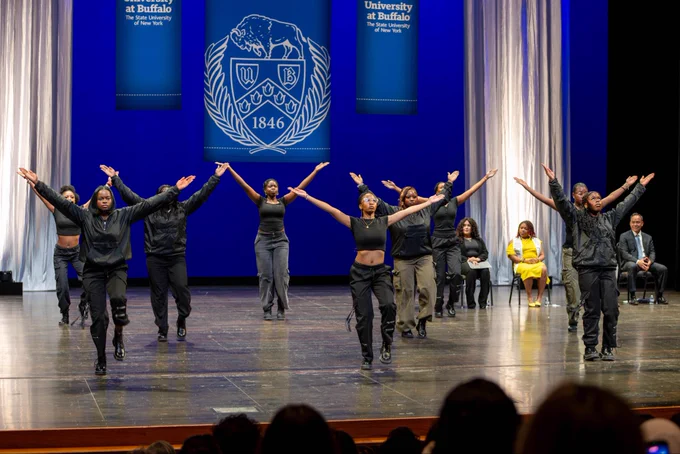 A student group performs on stage at the ALANA celebration.