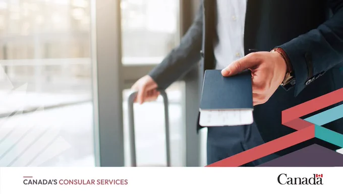 Person holding a passport and boarding pass near a suitcase in an airport setting with Canada Consular Services branding.