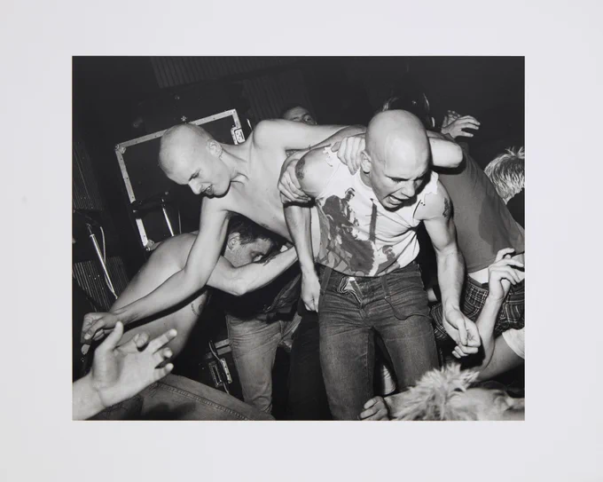 At auction, an iconic image by the rightly celebrated Chris Killip (1946-2020), titled "Angelic Upstarts at the Barbary Coast Club, Sunderland", a Miners' Strike Benefit Dance from December 1984.

A gelatin silver print with artist's stamp on the reverse.

Image: Roseberys London