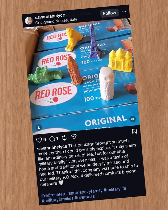 Boxes of Red Rose Original Black Tea stacked with colorful miniature landmarks on top, symbolizing comfort from home for a military family overseas.