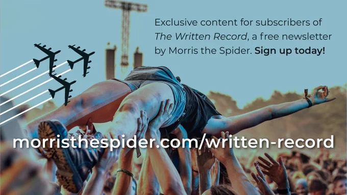 A female concertgoer crowd surfing at an outdoor music festival.