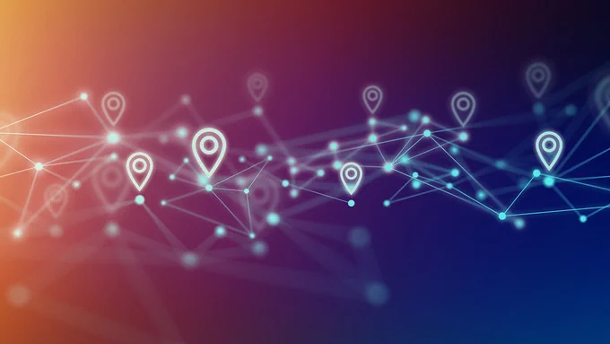Network of glowing location pins representing spatial data.