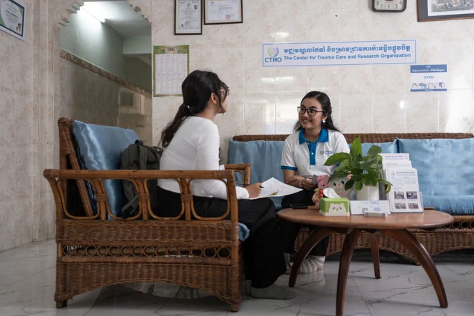 A young counsellor holds a mental health session in Cambodia.