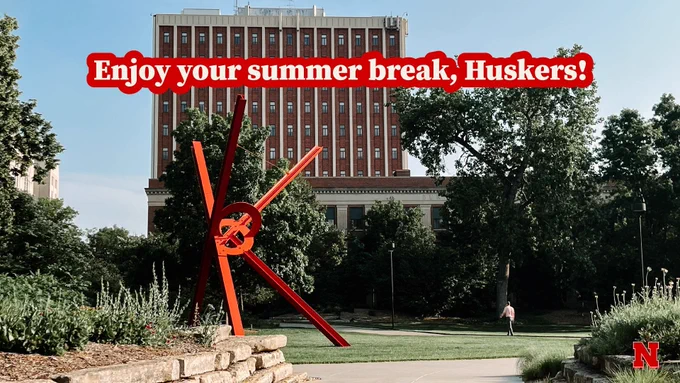 Enjoy your summer break Huskers text over an image of campus with Oldfather Hall