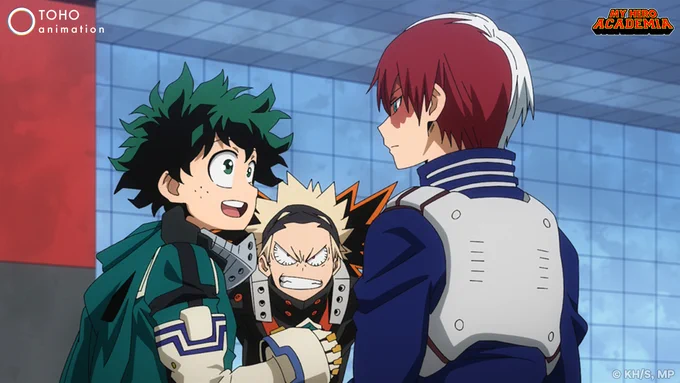 Midoriya speaks to Todoroki while Bakugo stands behind them with an angry look on his face.\n\n