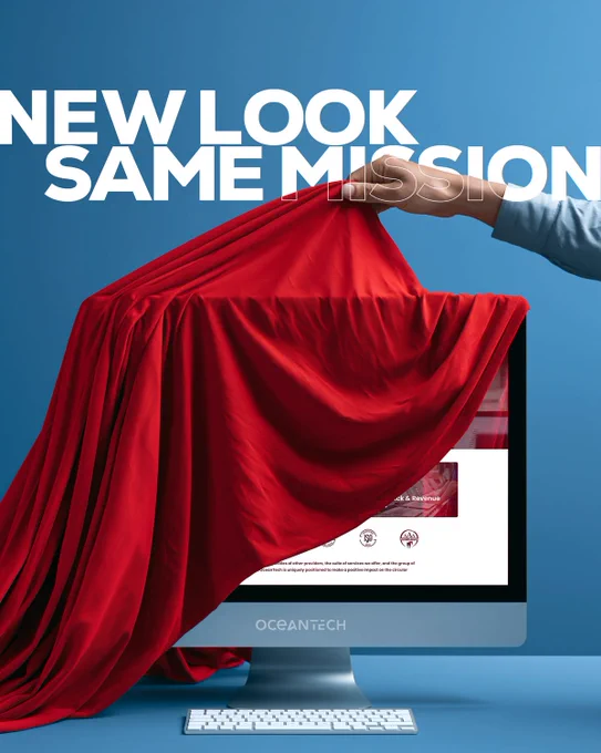 A hand pulls back a red cloth to reveal a desktop monitor showing the new OceanTech website. Large white text at the top reads "NEW LOOK SAME MISSION" against a solid blue background.