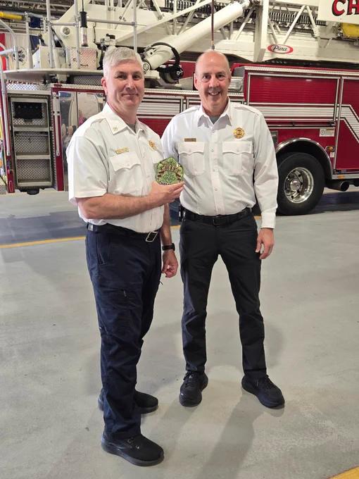 A photo of Deputy Chief Zaremba next to Chief Funk.