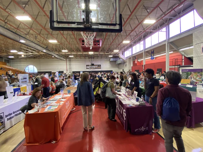 Image of the crowd at the disability and mental health summit resource fair. 