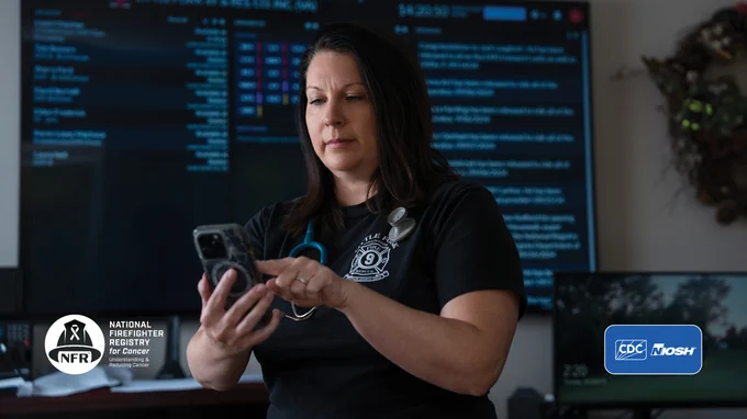 Firefighter/EMT using her phone to register for the National Firefighter Registry for Cancer. Image includes the NFR and CDC/NIOSH Logos
