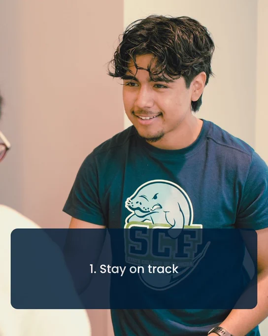 A person with wavy hair is smiling and wearing an SCF T-shirt featuring a seal logo. The text on the image reads, "1. Stay on track.