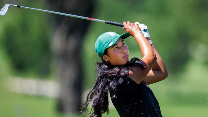 Janae Leovao finishes her swing from the fairway at the 2026 NCAA Tallahassee Regional at Seminole Legacy Golf Club in Tallahassee, Fla.