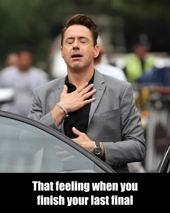 A man with a hand on his chest and his eyes closed.