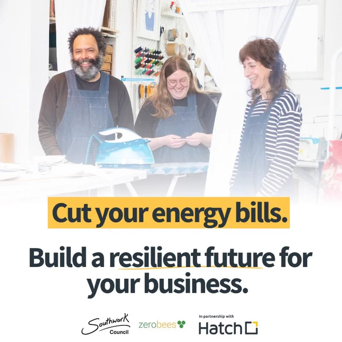 Three smiling people in a workshop with the slogan 'Cut your energy bills. Build a resilient future for your business.'