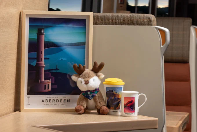Inverness poster, Munro the stag plushie, Edinburgh travel cup and Fort William mug.