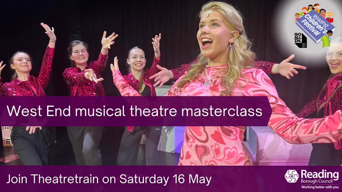 Young performers in sparkly pink tops and black trousers on stage for a musical theatre masterclass.