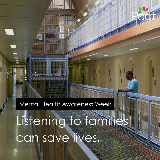 A prison landing with metal railings and walkways across multiple levels. One person leans on an upper-level railing looking across the landing. Overlaid text reads: “Mental Health Awareness Week” and “Listening to families can save lives.” The Pact logo appears in the top right corner.