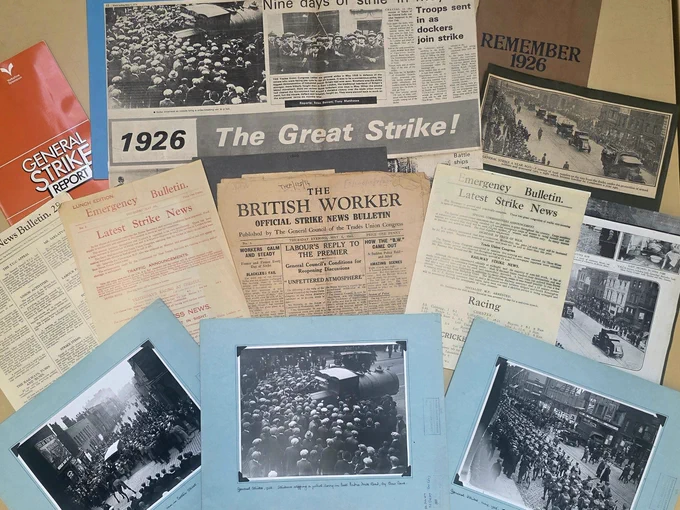 A display of library and archive material relating to the General Strike of 1926, including photographs, bulletins and newspaper articles