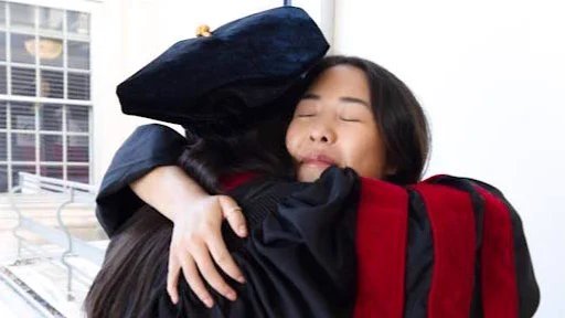 Women embracing