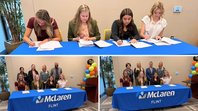 Nursing students signing commitments to McLaren