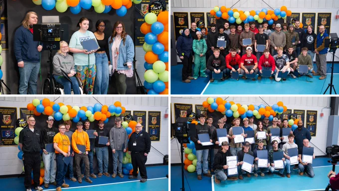 Group photo of students and their recognitions.