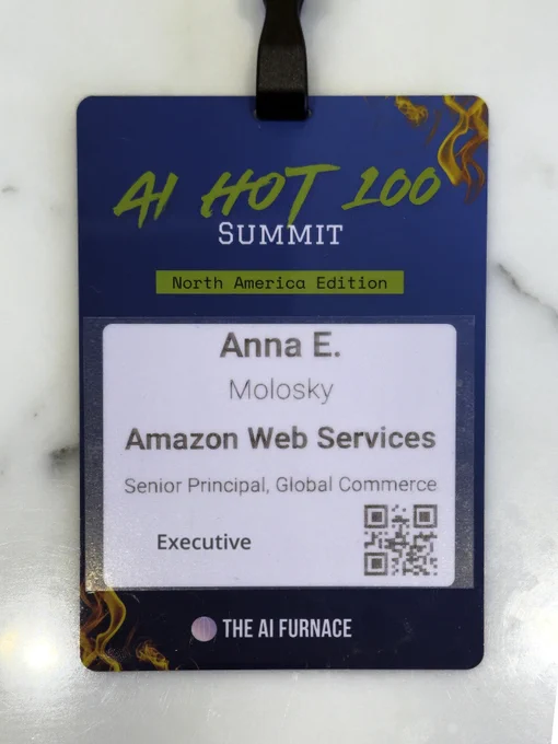 Executive VIP badge from the AI Hot 100 Summit. 