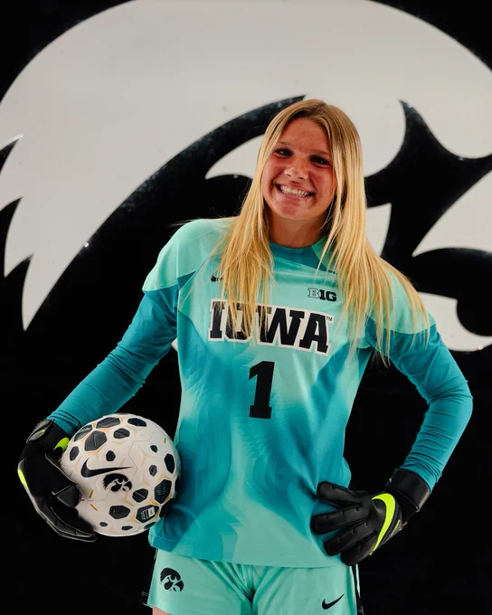 Iowa soccer commit Braelynn Galt holds a soccer ball