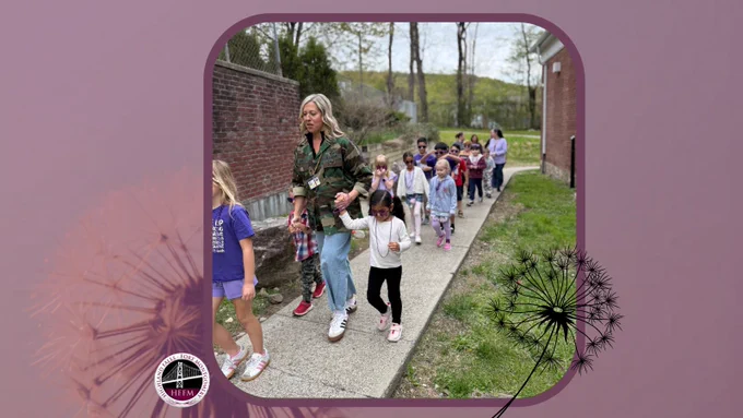 The Purple Up Parade is a time for Staff to lead the Military Children and this year the Staff Spouses and Children accompanied the students
