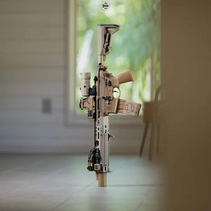RailScales QTR Stop, Karve-P M-LOK Hand Stop, G10 RailScales M-LOK Scales (Dragon, TerraCore, 3-Slot & 4-Slot), LAO Sling Mount | Sig Sauer MCX-SPEAR LT SD (6.75" 300BLK SBR) w/ SLH762Ti Suppressor in Coyote, EOTech OGL Laser w/ Unity Tactical ModButton Lite, Surefire M640U-Pro Scout Light Pro Light w/ CSM-07 M-LOK Switch, Dura Mag 30rd Bronze Magazine, Sig Sauer Romeo9T RDS & Juliet4 Magnifier, Poi Tac ST-MCX-LT Sling Mount, Magpul SL-M Stock.