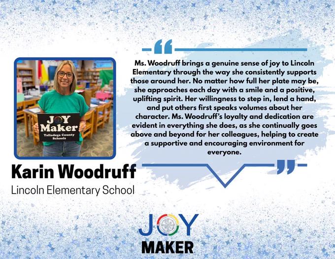 Karin Woodruff  Holding Joy Maker Sign