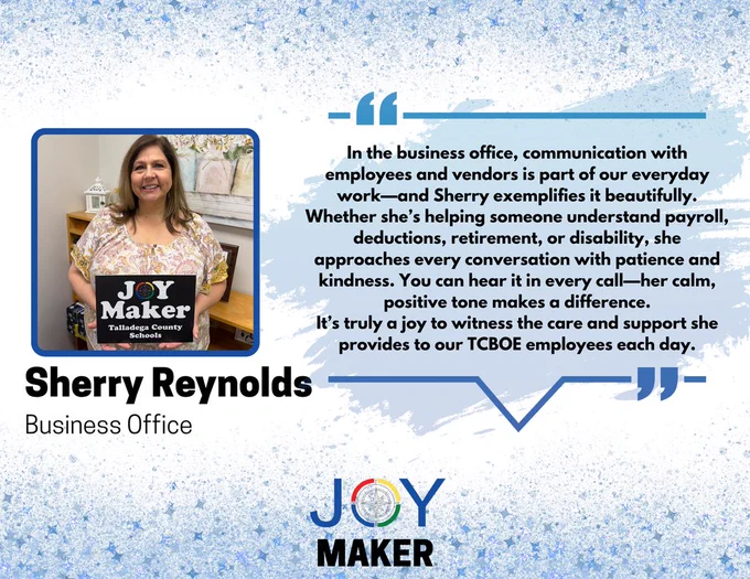 Sherry Reynolds Holding Joy Maker Sign