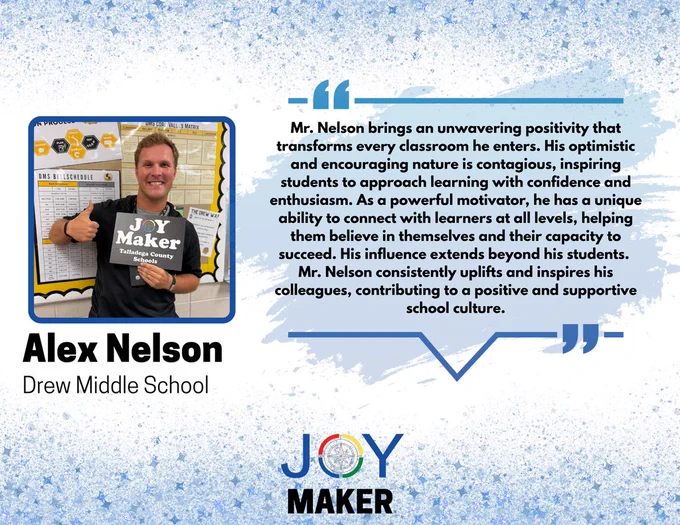 Alex Nelson Holding Joy Maker Sign