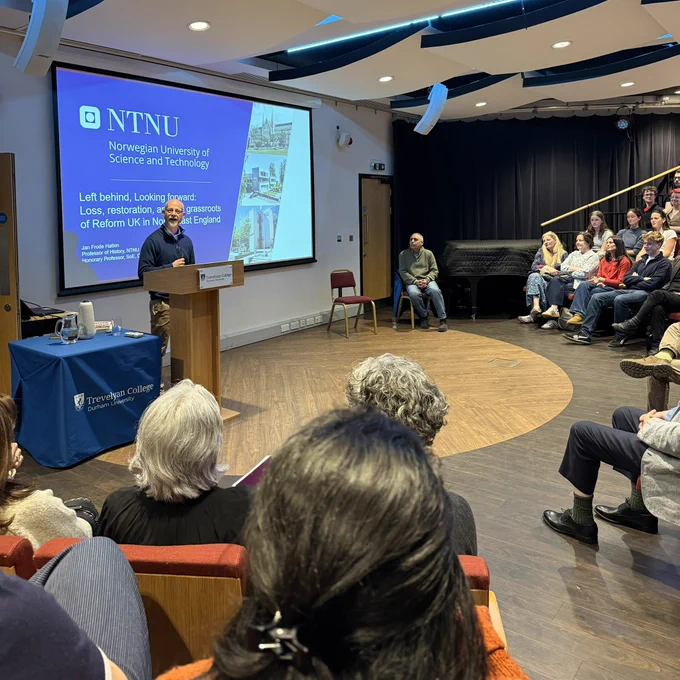The speaker begins the lecture