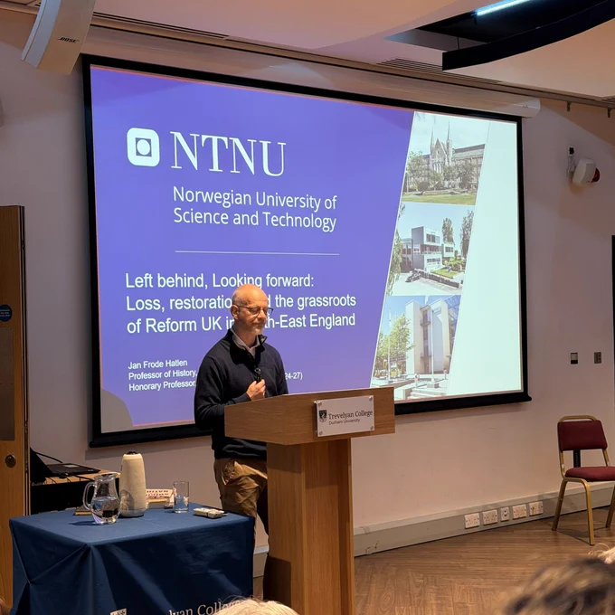 The speaker begins the lecture