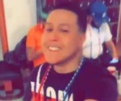 In an image from court documents Westyn Lantigua can be observed wearing a Trinitario beaded necklace.