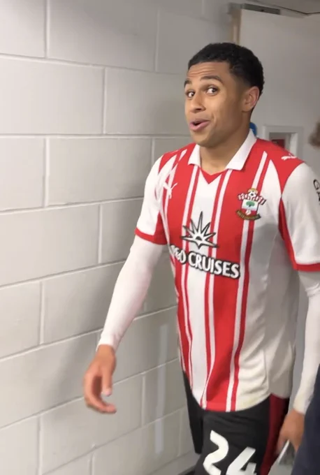 A screenshot of Shea Charles looking at the camera following the full time whistle and puffing his cheeks out. 